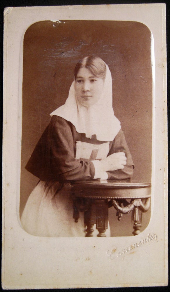 Item #028461 Circa 1895 Carte-de-Visite Photograph of A Nursing Sister with the Red Cross on Her Uniform By A. Camenenko St. Petersburg Russia. Russia - History - Medicine - Red Cross.