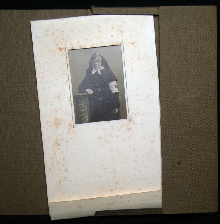 Item #028474 Circa 1918 Cabinet Card Photograph of a Nursing Sister Wearing A Red Cross Armband By Bowman Toledo Ohio. Americana - History - Medicine - Red Cross -Toledo Ohio - Bowman.