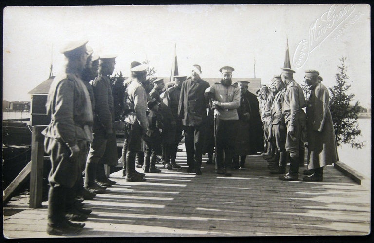 Item #028483 Circa 1918 Real Photo Postcard of a Wounded Man Under Military Escort & Review in Haparanda Sweden By Mia Green. Sweden - 20th century - Military History - Photography - Haparanda - Mia Green.