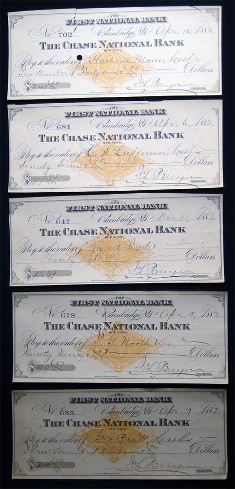 Item #028596 1882 Five Checks Written on The First National Bank Bainbridge New York and The Chase National Bank to Various Recipients with Cashier Signatures, Endorsements and Stamps. Americana - 19th Century - Business History - Banking - Bainbridge New York - First National Bank.
