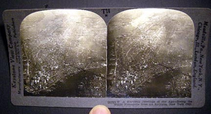 Item #19799 Stereoview Photograph Of A Startling Privilege of the Age - Seeing the World Metropolis From an Airplane, New York City By Keystone View Company. New York City.