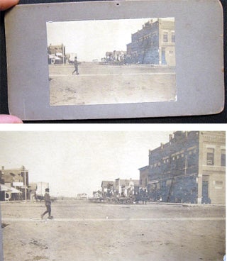 Item #20967 C. 1899 Photograph on a stereoview mount card of a street scene, probably in the...