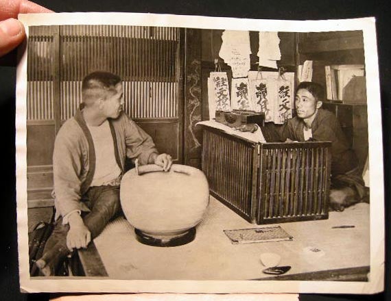 Item #22181 1922 Press Photograph of the Business Department of a Japanese Store. Photography - Japan -20th Century.