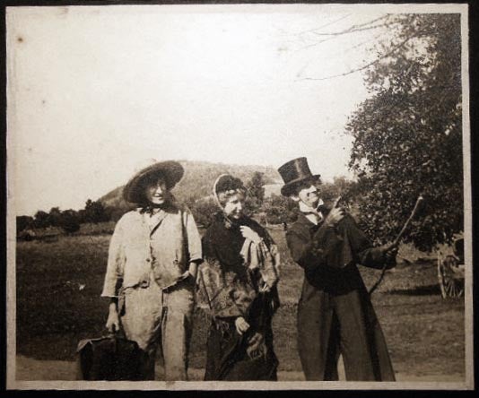 Item #24853 Circa 1910 Large Format Photograph of 3 Young People in Humorous Period Costume. Americana - 20th Century - Photography - Costume - Entertainment.