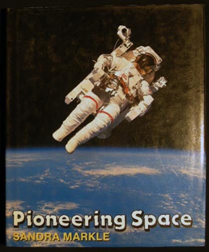 Item #25581 Pioneering Space. Sandra Markle.