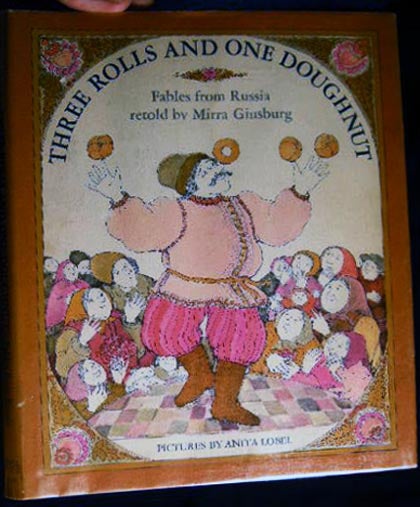 Item #7993 Three Rolls and One Doughnut: Fables from Russia Retold By Mirra Ginsburg. Mirra Ginsburg.